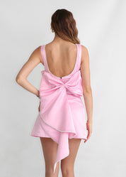 THALIE - mini dress rosa con scollo posteriore e fiocco svasato con perline