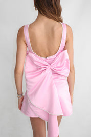 THALIE - mini dress rosa con scollo posteriore e fiocco svasato con perline