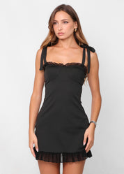 SAIDE - vestito mini nero con fiocchi alle spalle e dettagli in tessuto mesh