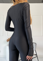 IVY - tuta jumpsuit aderente nera effetto lucido