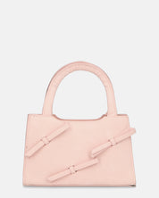 RIBBY - borsetta a mano rosa con chiusura a cerniera e fiocchetti decorativi