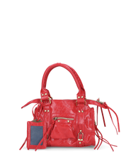 SKYLAR - borsetta a mano rossa con chiusura zip e frangette
