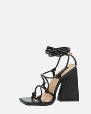 NURAY - sandales à talons hauts en éco-cuir noir avec lacets