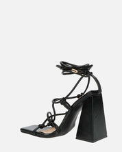 NURAY - sandales à talons hauts en éco-cuir noir avec lacets