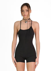 REMI - tuta jumpsuit corta con arricciatura e lacci posteriori.