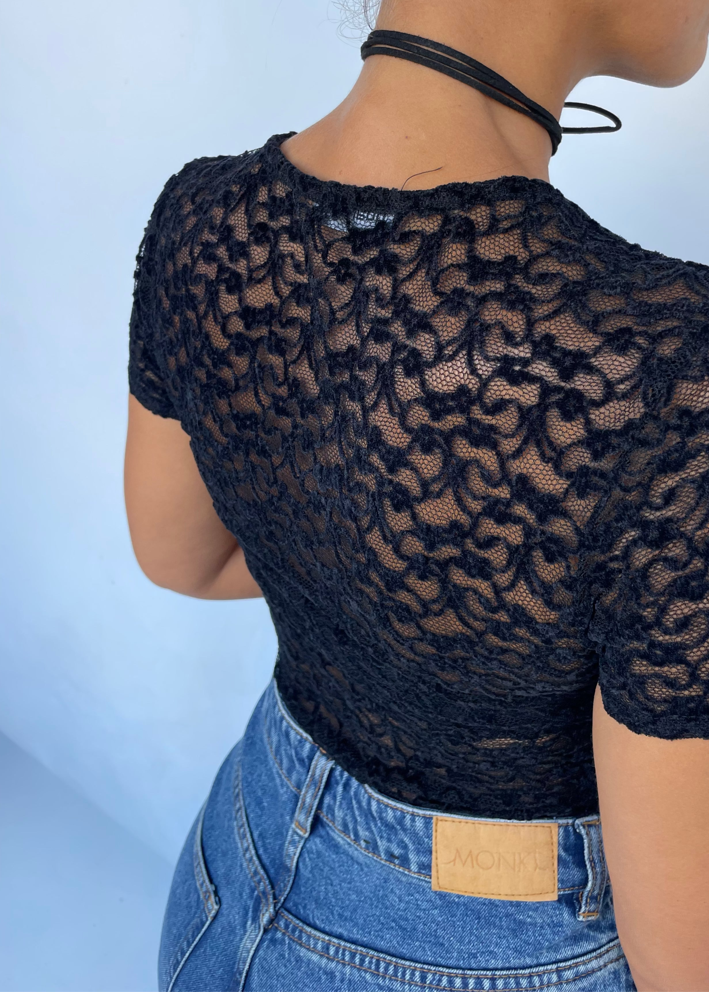 DONNA -body maniche corte in pizzo disegni in rilievo nero
