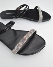 MELIA - sandali flat neri con dettagli metallici