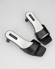 TITTI - sandali con tacco in ecopelle nera con soletta bianca