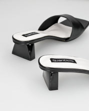 TITTI - sandali con tacco in ecopelle nera con soletta bianca