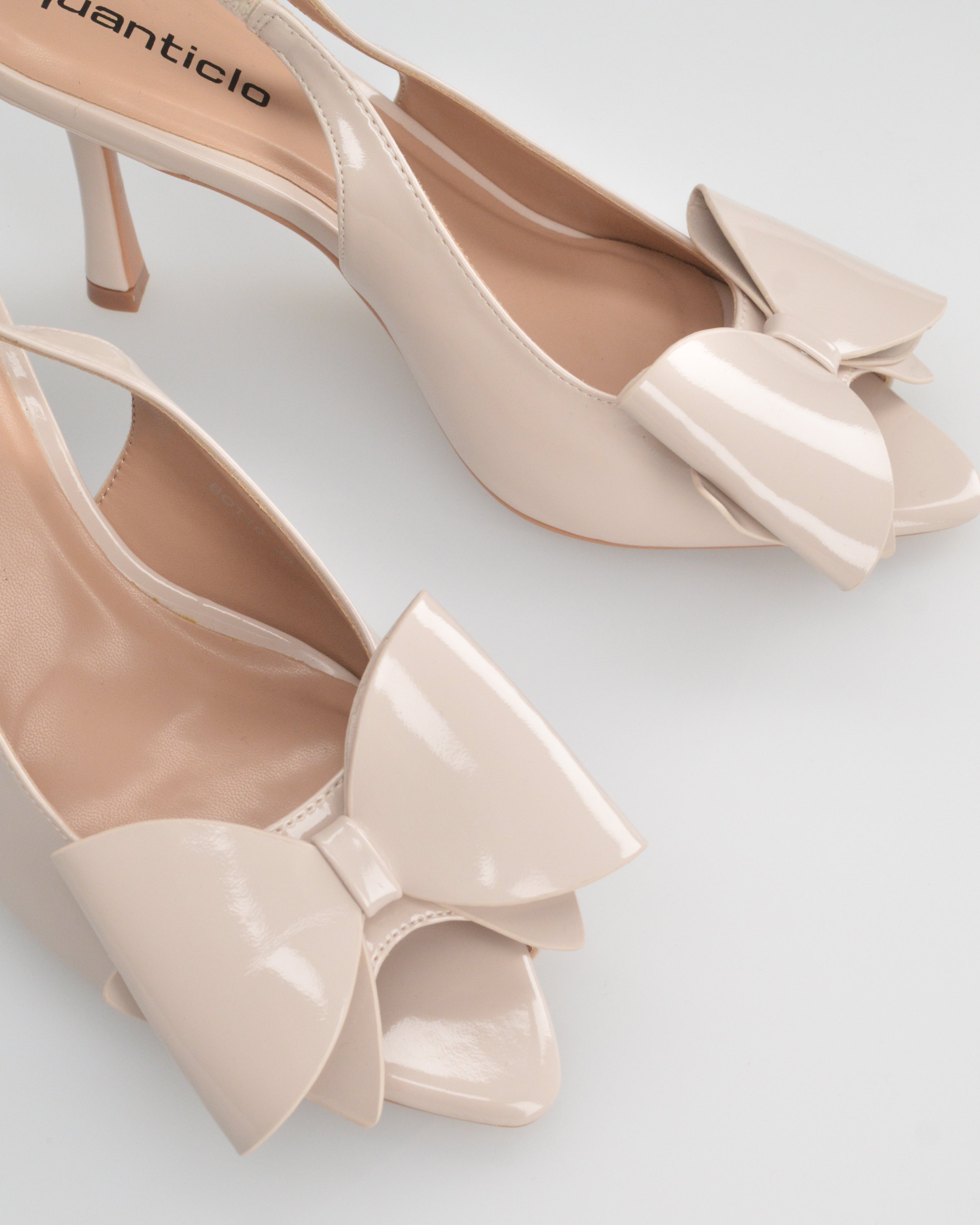 JULIE - décolleté beige con fiocco in punta