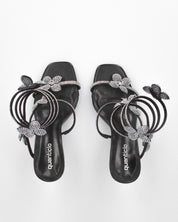 FABIOLA - sandali neri a spirale con fiori glitter