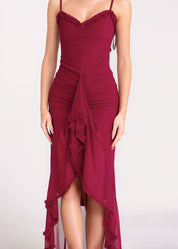 EMMANUELA - vestito bordeaux lungo con fondo asimmetrico e volant