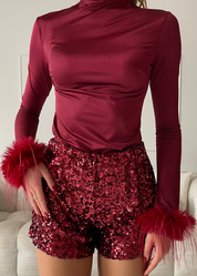 REVES - top wine effetto lucido con polsini in piume