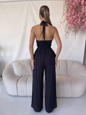 ILES - tuta jumpsuit con pantalone ampio e scollo con volant