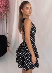 AKIE - vestito corto a balze nero con pois bianchi