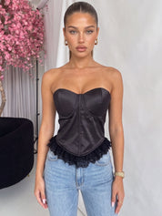 CALA - top corpetto nero effetto satin con orlo in pizzo