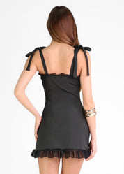 SAIDE - vestito mini nero con fiocchi alle spalle e dettagli in tessuto mesh