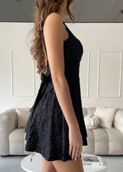 VERONICA - vestito mini nero con gonna ampia con scollo posteriore e fiocco