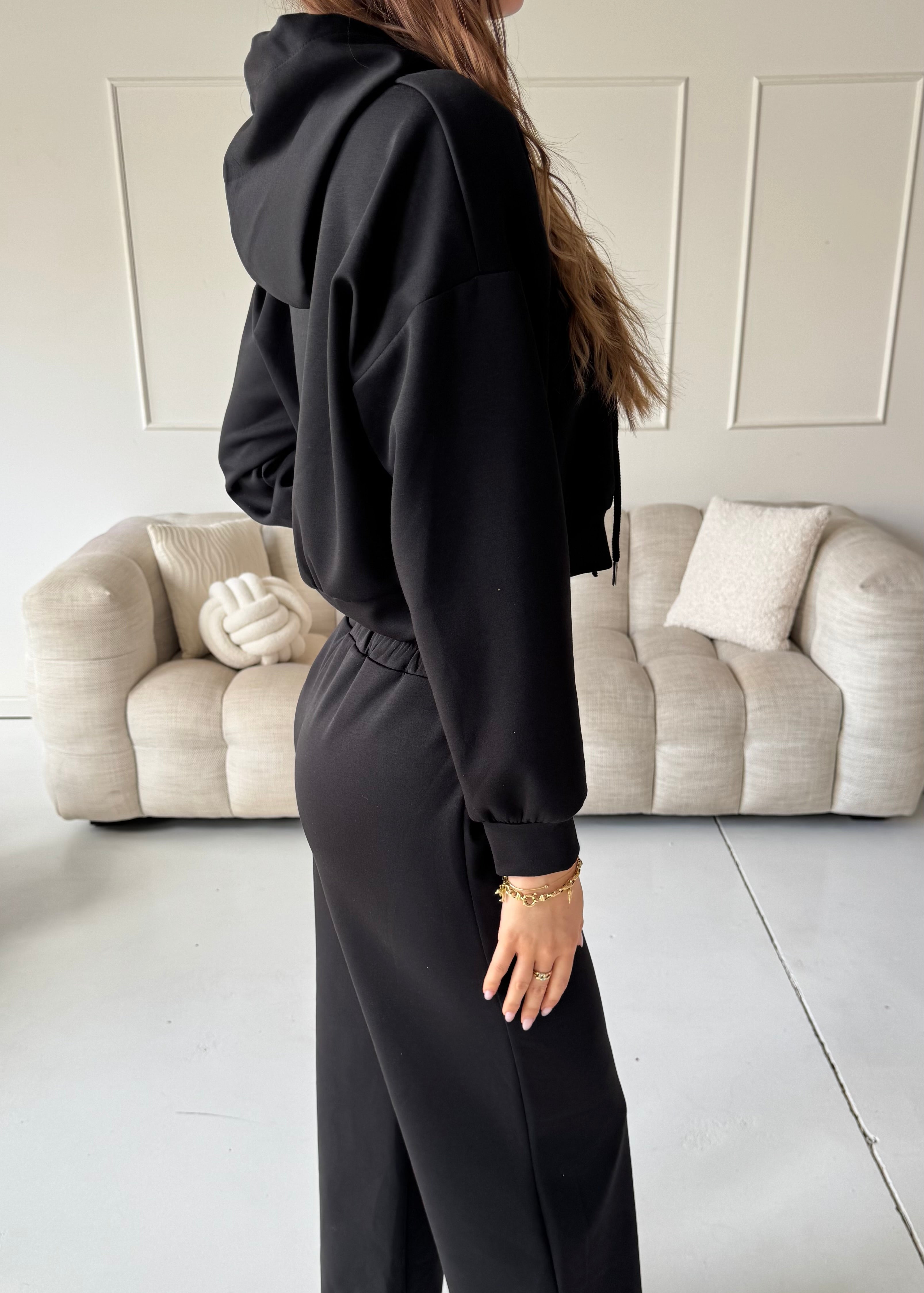 TAMIE - tuta nera con felpa, top corpetto e pantalone a zampa