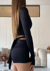 NADJA - set coordinato shorts, coprispalle e top in nero