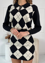 PERLY - set in maglia polo e gonna a motivo rombo in nero