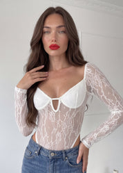 RANIE - body in pizzo bianco con maniche lunghe