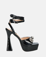 JANINE - tacchi alti con platform in glassy nero e fiocco con gemme
