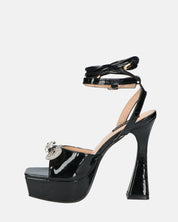 JANINE - tacchi alti con platform in glassy nero e fiocco con gemme